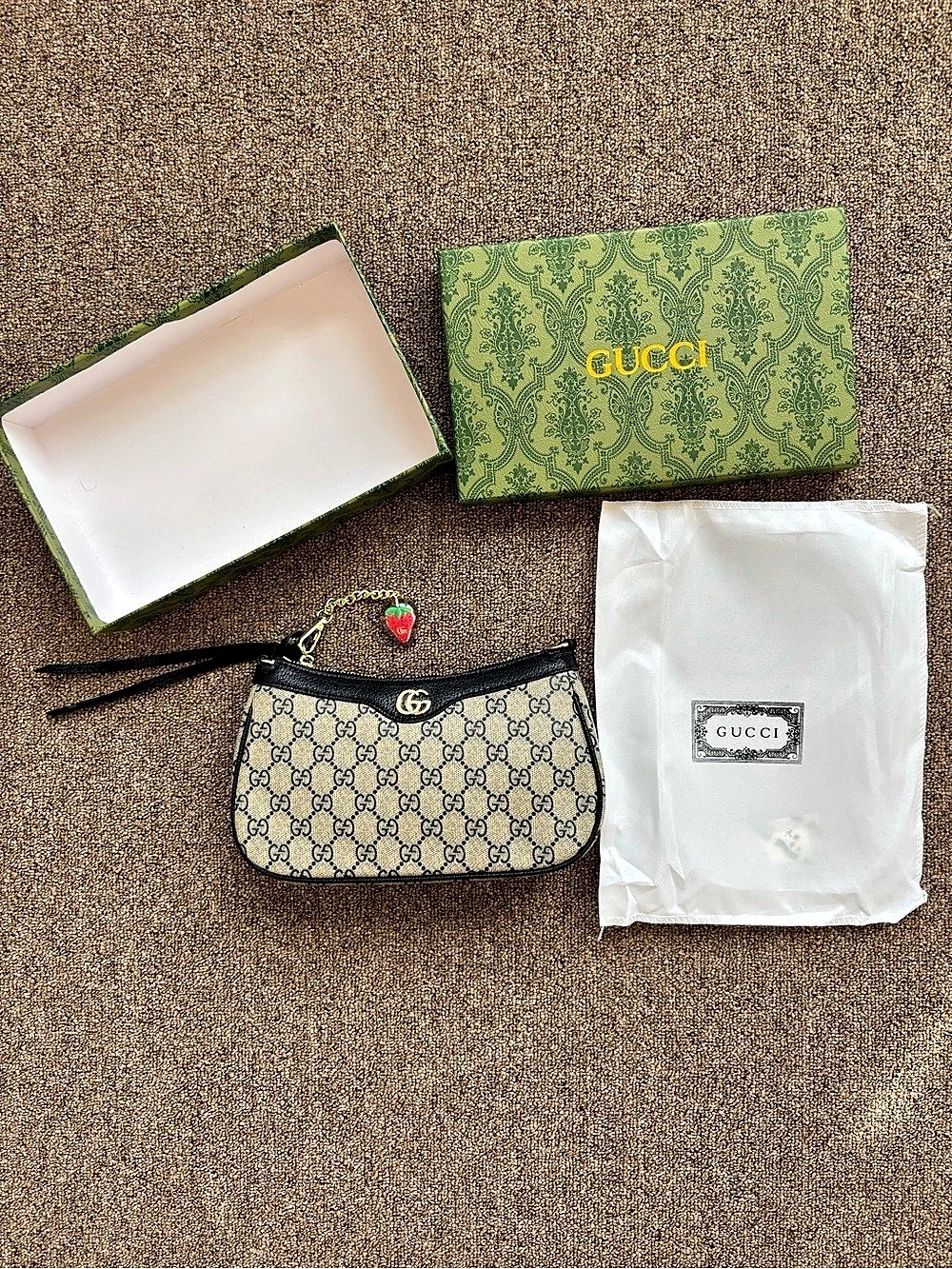 Gucci GG Canvas Mini Wristlet in Beige & Black